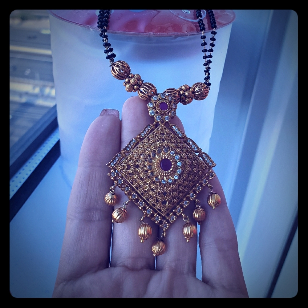Ethnic native gold necklace